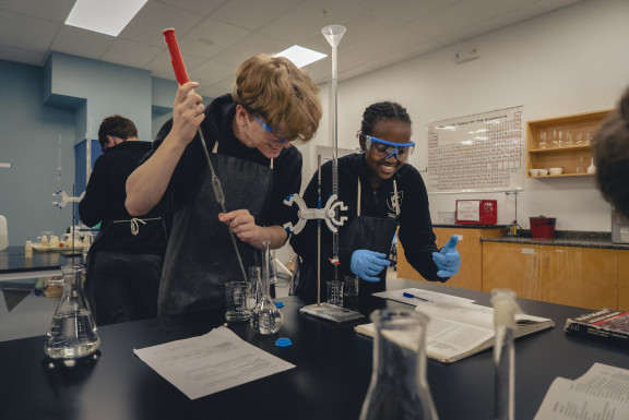 Two students working on a science lab